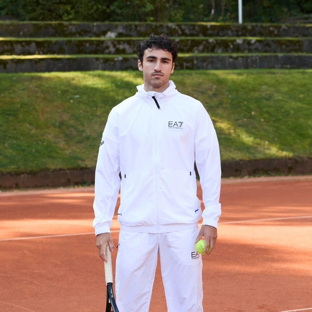 TENNIS COACH OLI